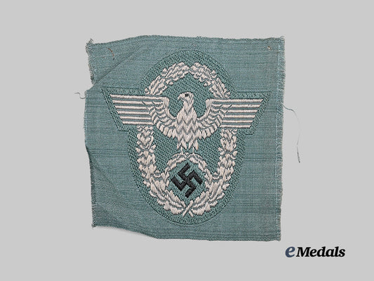 germany,_ordnungspolizei._a_mint_schutzpolizei_sleeve_eagle_for_enlisted_ranks_e_medals__g64305_2