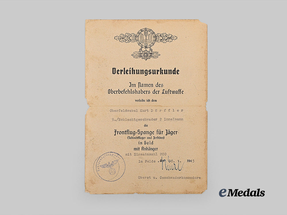 germany,_luftwaffe._a_lot_of_award_documents_to_oberfeldwebel_kurt_dörffler,_stuka_pilot,_with_hans-_ulrich_rudel_signature_e_medals__g64382_3