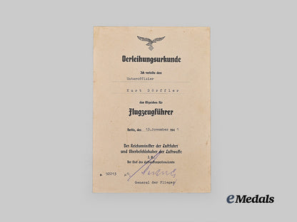 germany,_luftwaffe._a_lot_of_award_documents_to_oberfeldwebel_kurt_dörffler,_stuka_pilot,_with_hans-_ulrich_rudel_signature_e_medals__g64382_9