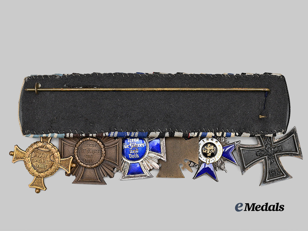 germany,_third_reich._a_medal_bar_for_first_world_war_and_n_s_d_a_p_long_service_e_medals__g64432_5