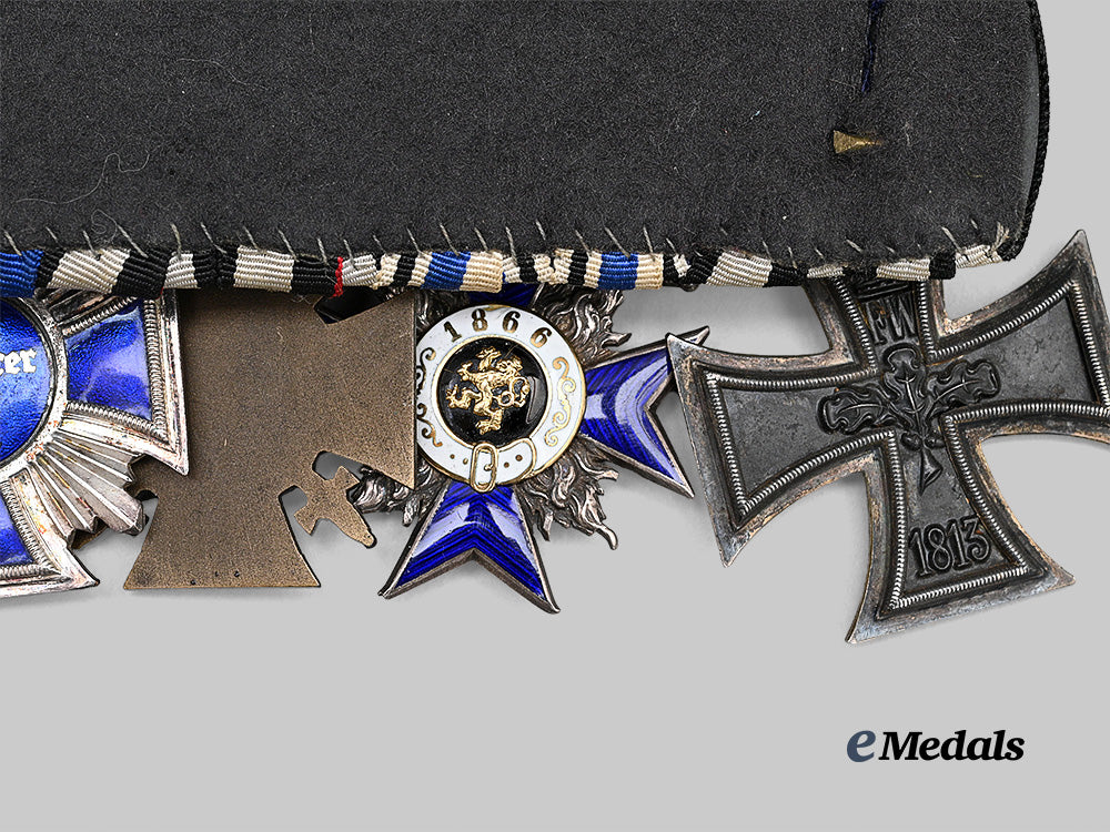 germany,_third_reich._a_medal_bar_for_first_world_war_and_n_s_d_a_p_long_service_e_medals__g64432_6