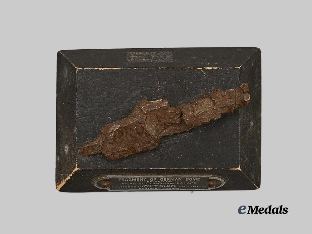 united_kingdom._a_german_bomb_fragment_on_plaque_e_medals__g_b8338_5