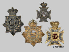 United Kingdom. A Lot of Four Helmet Plates