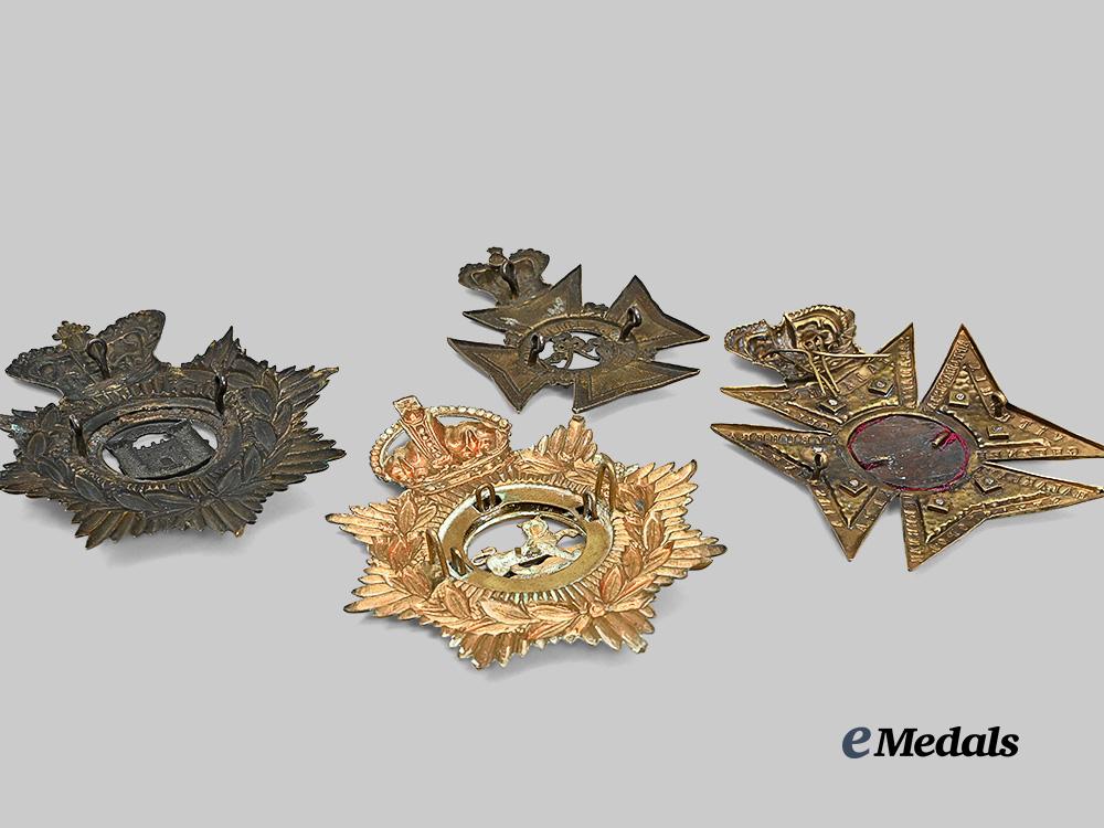 united_kingdom._a_lot_of_four_helmet_plates_e_medals__g_b8441_4