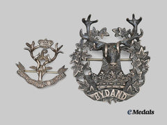 United Kingdom. A Pair of Sterling Silver Highlander Badges