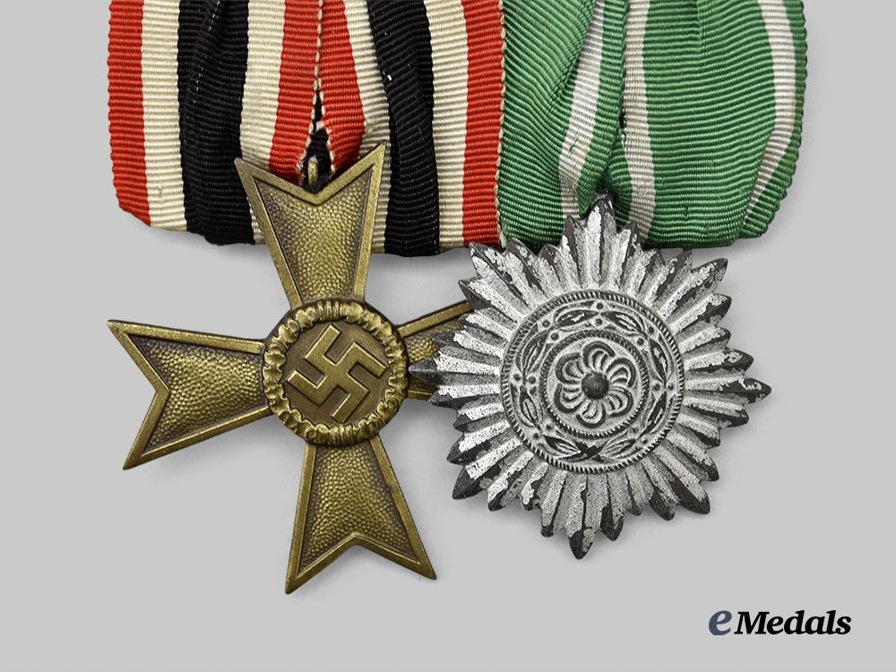 germany,_wehrmacht._a_medal_bar_for_an_eastern_volunteer_non-_combatant_e_medals__m0076-158_3