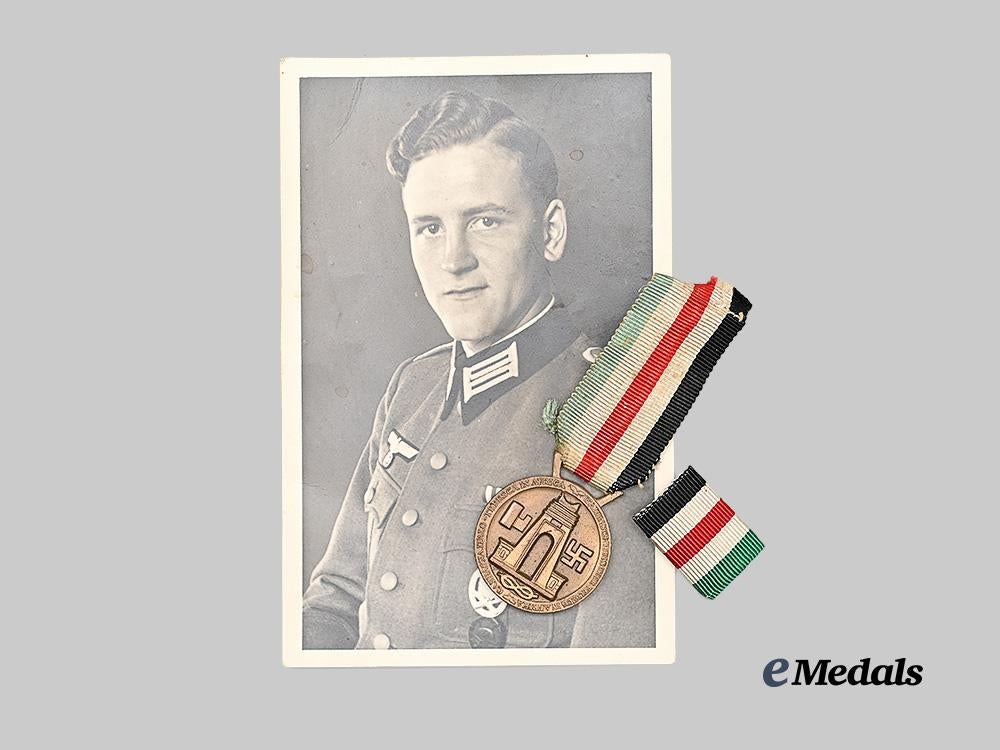 germany,_heer._an_italian-_german_african_campaign_medal,_type_i_i,_with_ribbon_bar_and_recipient_photo_e_medals__m0405-103_2