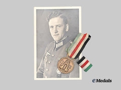 Germany, Heer. An Italian-German African Campaign Medal, Type II, with Ribbon Bar and Recipient Photo