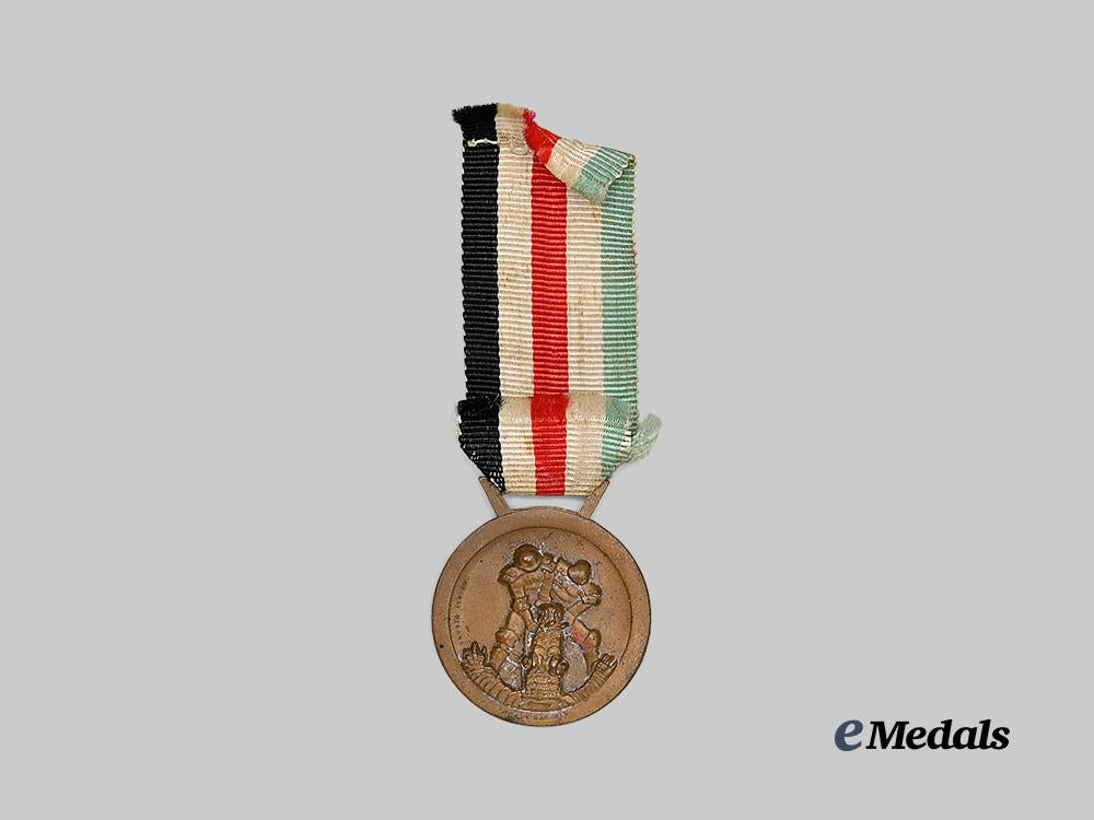 germany,_heer._an_italian-_german_african_campaign_medal,_type_i_i,_with_ribbon_bar_and_recipient_photo_e_medals__m0405-103_8
