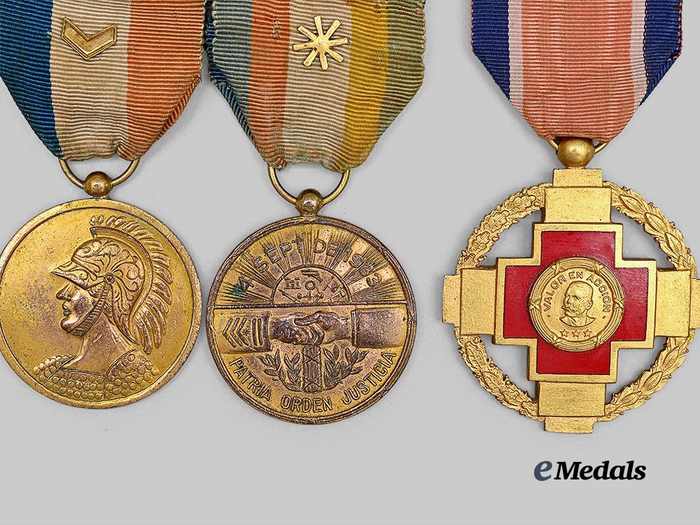 cuba,_spain._a_group_of_three_cuban_campaign_and_volunteer_service_medals_e_medals__m0440-28_3