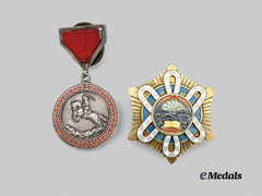 Mongolia, People’s Republic. An Order of the Polar Star and an Honorary Medal of Combat