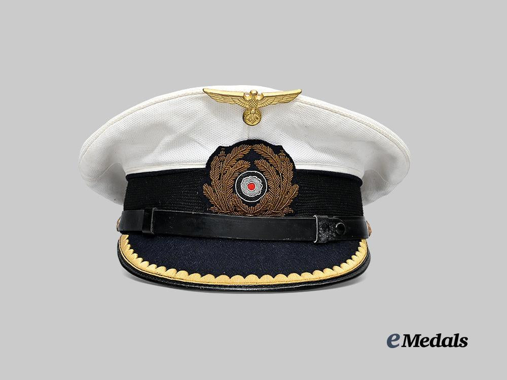 germany,_kriegsmarine._a_junior_officer’s_white_visor_cap_e_medals__m0676-413_2