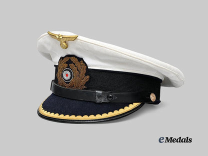 germany,_kriegsmarine._a_junior_officer’s_white_visor_cap_e_medals__m0676-413_3