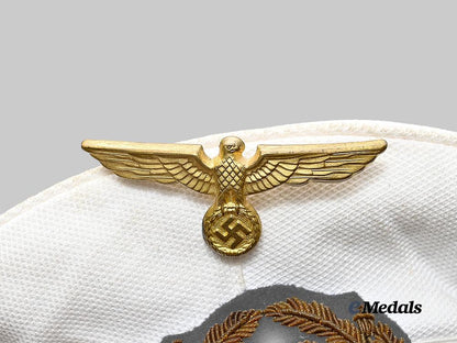 germany,_kriegsmarine._a_junior_officer’s_white_visor_cap_e_medals__m0676-413_8