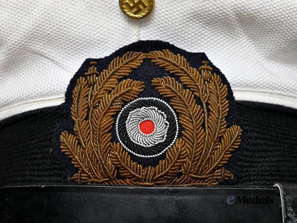 germany,_kriegsmarine._a_junior_officer’s_white_visor_cap_e_medals__m0676-413_9