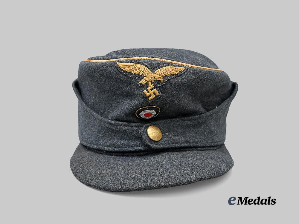 germany,_luftwaffe._a_rare_general’s_m43_field_cap_e_medals__m0676-421_2