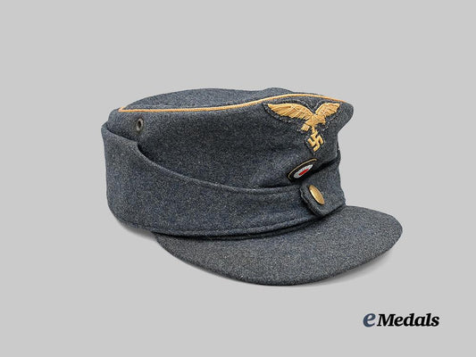 germany,_luftwaffe._a_rare_general’s_m43_field_cap_e_medals__m0676-421_3