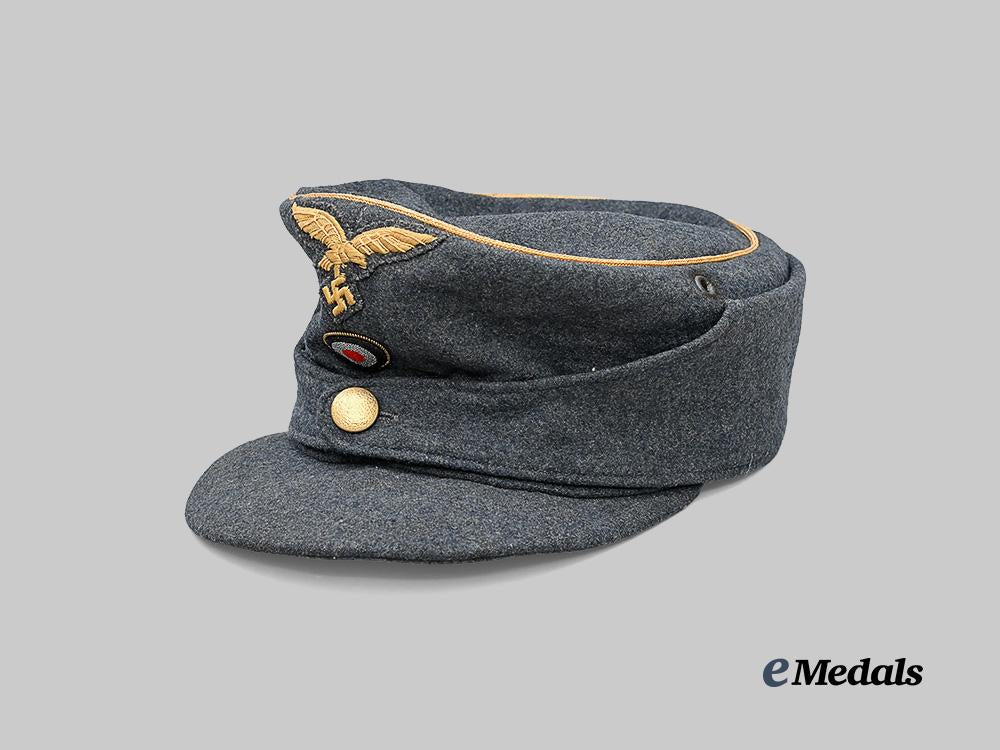 germany,_luftwaffe._a_rare_general’s_m43_field_cap_e_medals__m0676-421_4