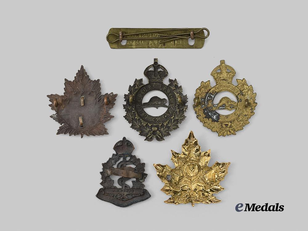 canada,_c_e_f._a_lot_of_first_war_cap_badges_and_wound_stripe_e_medals__m0694-178_3
