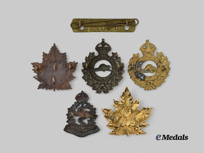 canada,_c_e_f._a_lot_of_first_war_cap_badges_and_wound_stripe_e_medals__m0694-178_3