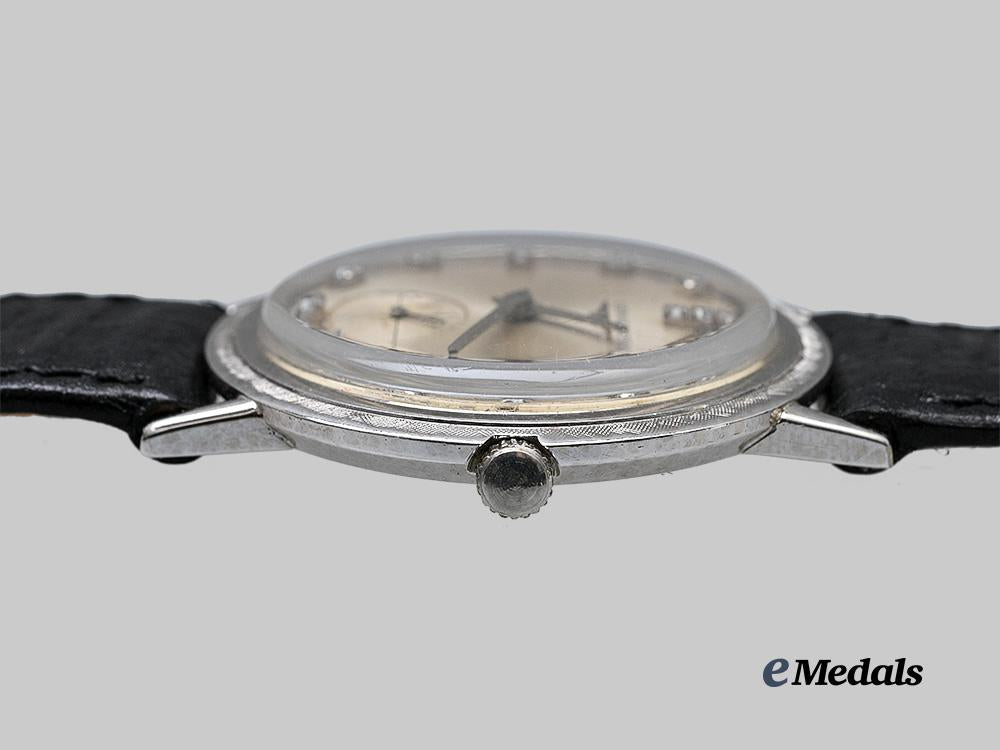 switzerland._a_longines_art_deco_gold_men's_diamond_watch,_c.1955_e_medals__m0699-8_9