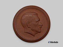Germany, Third Reich. An AH Patriotic Medallion, by Meissen Porcelain