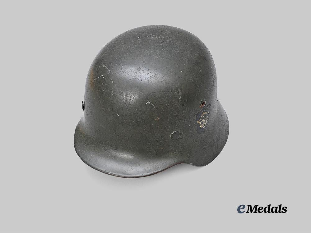 germany,_ordnungspolizei._a_rare_m35_stahlhelm,_double-_decal_and_owner-_attributed_version,_by_vereinigte_deutsche_nickelwerke_e_medals__m0714-3_4
