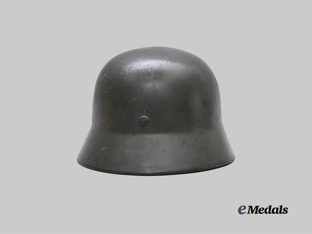 germany,_ordnungspolizei._a_rare_m35_stahlhelm,_double-_decal_and_owner-_attributed_version,_by_vereinigte_deutsche_nickelwerke_e_medals__m0714-3_5
