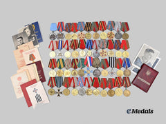International. A Large Lot of Eastern European Medals and Medal Booklets