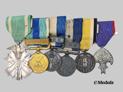 Japan, Empire. A Golden Kite Medal Bar of Six Decoration