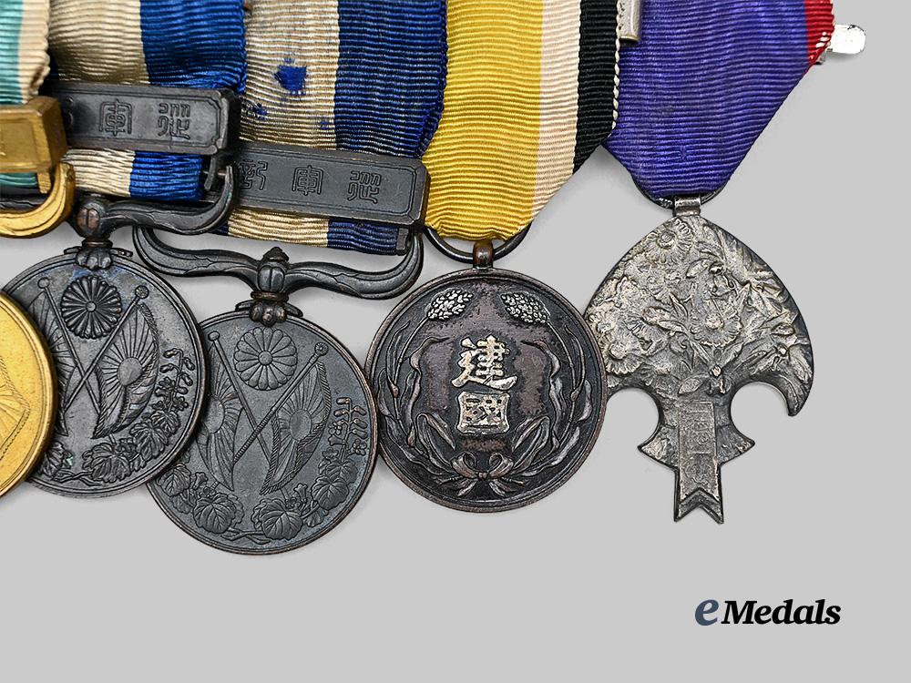 japan,_empire._a_golden_kite_medal_bar_of_six_decoration_e_medals__w8488_3
