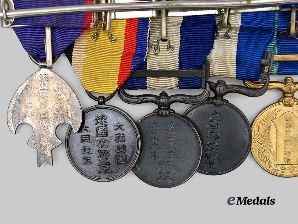 japan,_empire._a_golden_kite_medal_bar_of_six_decoration_e_medals__w8488_7