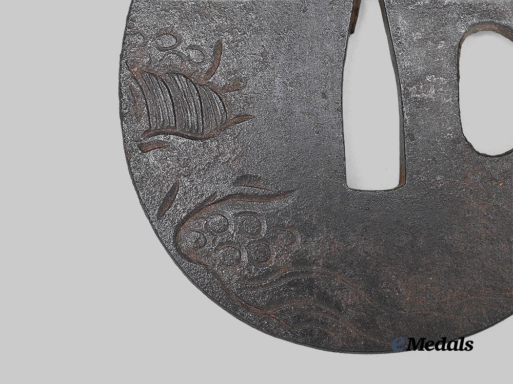japan,_empire._a_tsuba_with_sennin_figure_e_medals__w8743_4