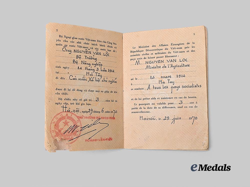 vietnam._a_lot_of_vietnam_war_era_paper_ephemera_and_diplomatic_passports_e_medals__w8752_8