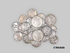 United States. A Lot of 29 American Silver Dollars and Half Dollars