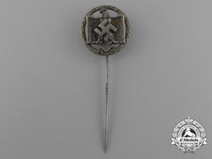 A 1939 National Socialist League Of The Reich For Physical Exercise Silver Grade Performance Badge