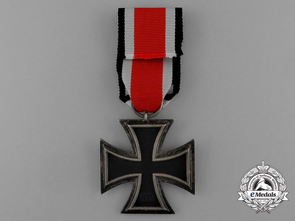 an_austrian_made_iron_cross1939_second_class_by_friedrich_orth_in_its_original_packet_of_issue_e_0036