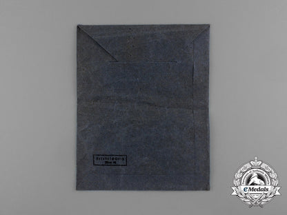 an_austrian_made_iron_cross1939_second_class_by_friedrich_orth_in_its_original_packet_of_issue_e_0040