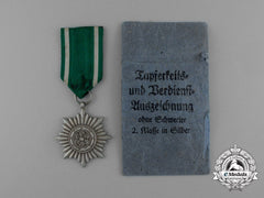 An Austrian Made Silver Grade Ostvolk Merit Medal In Its Original Packet Of Issue By Rudolf Souval