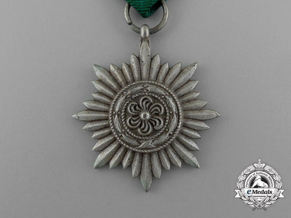 an_austrian_made_silver_grade_ostvolk_merit_medal_in_its_original_packet_of_issue_by_rudolf_souval_e_0043