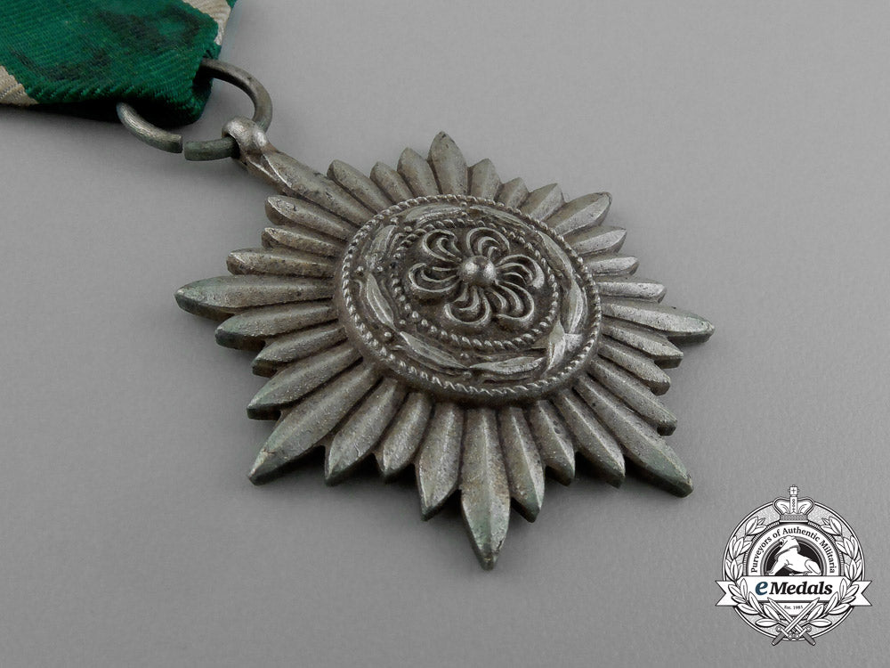 an_austrian_made_silver_grade_ostvolk_merit_medal_in_its_original_packet_of_issue_by_rudolf_souval_e_0045