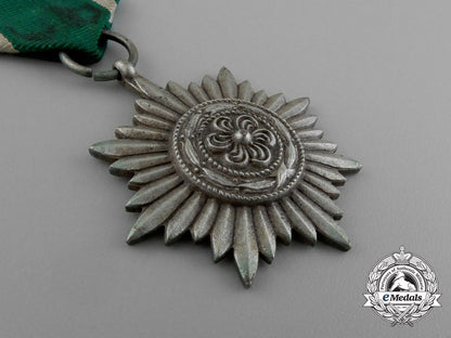an_austrian_made_silver_grade_ostvolk_merit_medal_in_its_original_packet_of_issue_by_rudolf_souval_e_0045