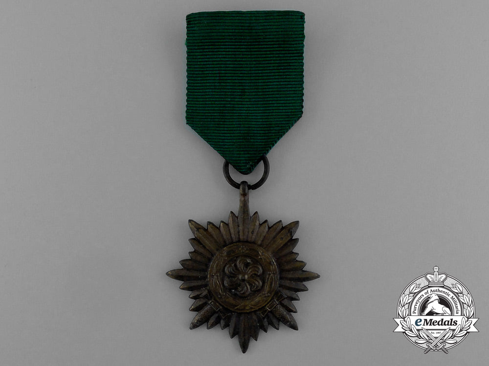 a_bronze_grade_ostvolk_merit_medal_with_swords_in_its_original_packet_of_issue_by_rudolf_wächtler&_lange_e_0048