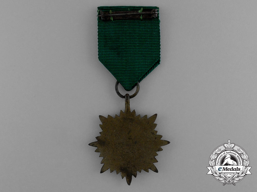 a_bronze_grade_ostvolk_merit_medal_with_swords_in_its_original_packet_of_issue_by_rudolf_wächtler&_lange_e_0050