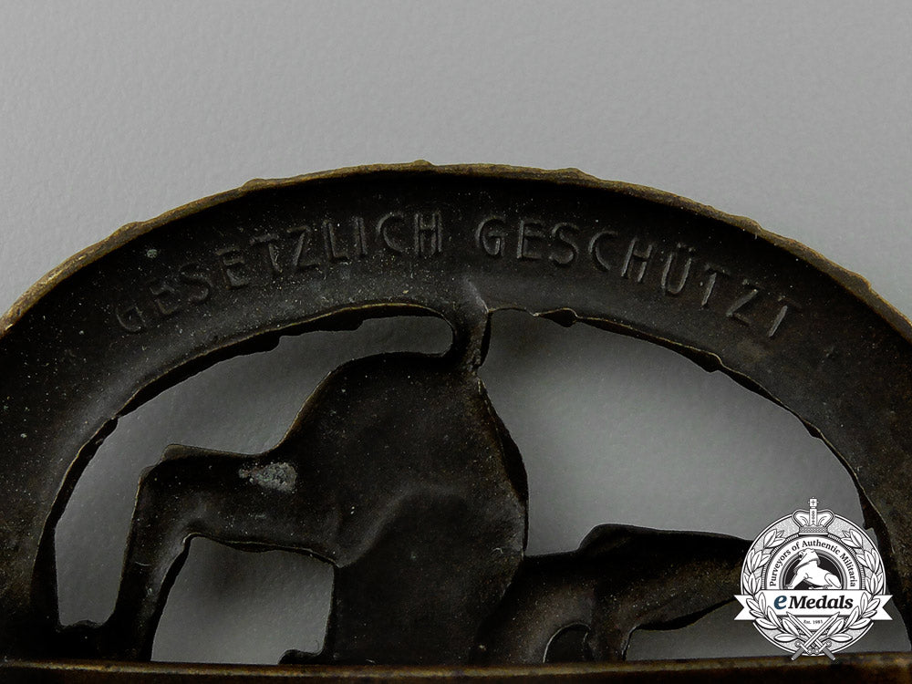 a_mint_cased_bronze_grade_german_equestrian_badge_and_stick_stick_pin_by_l._chr._lauer_e_0077
