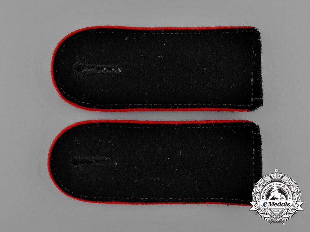 a_mint_matching_pair_of_waffen-_ss_artillery_enlisted_man’s_shoulder_straps_e_0137