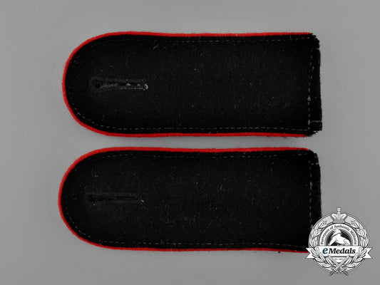 a_mint_matching_pair_of_waffen-_ss_artillery_enlisted_man’s_shoulder_straps_e_0137
