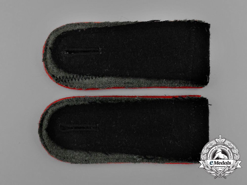 a_mint_matching_pair_of_waffen-_ss_artillery_enlisted_man’s_shoulder_straps_e_0138