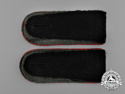 a_mint_matching_pair_of_waffen-_ss_artillery_enlisted_man’s_shoulder_straps_e_0138