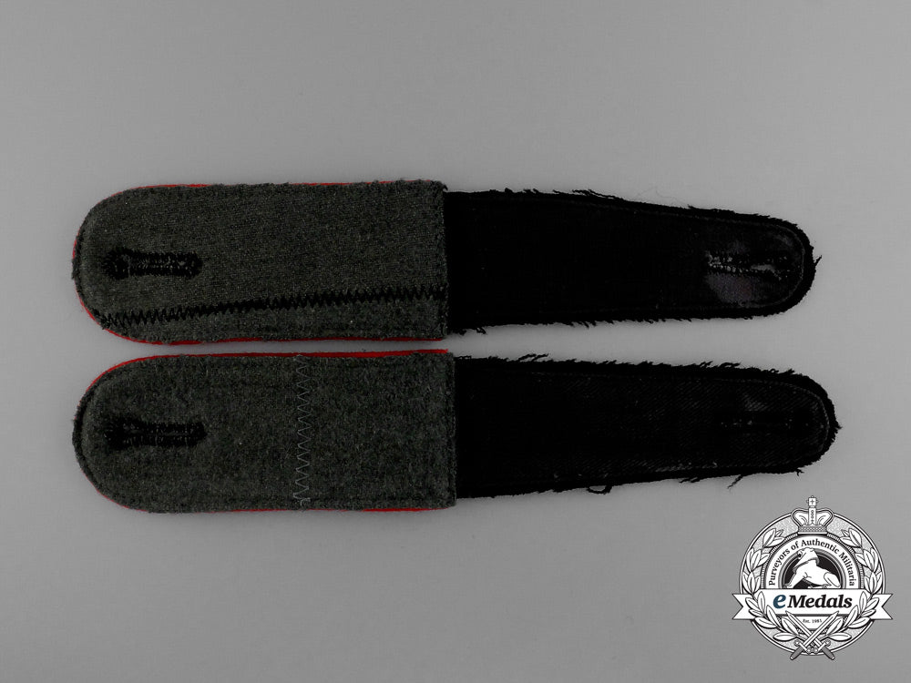 a_mint_matching_pair_of_waffen-_ss_artillery_enlisted_man’s_shoulder_straps_e_0139